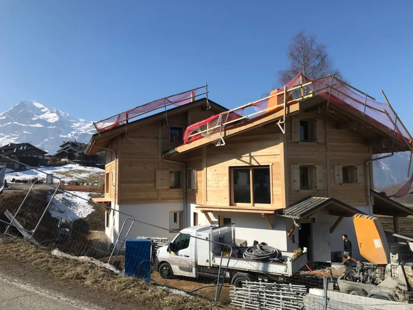 Réalisation d'un collectif d'appartement - Bardage mélèze - Les Carroz